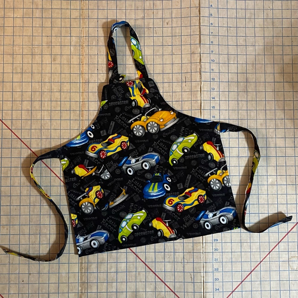 Apron, handmade, race car fabric, size Small (approx 3-5 years)
